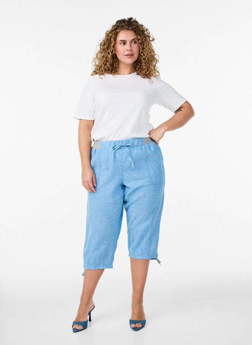 Cotton and linen Capri trousers with an elasticated waist and tie-string, Blue, Model image number 0