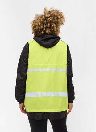 Yellow running vest with reflectors, Neon Yellow, Model image number 1