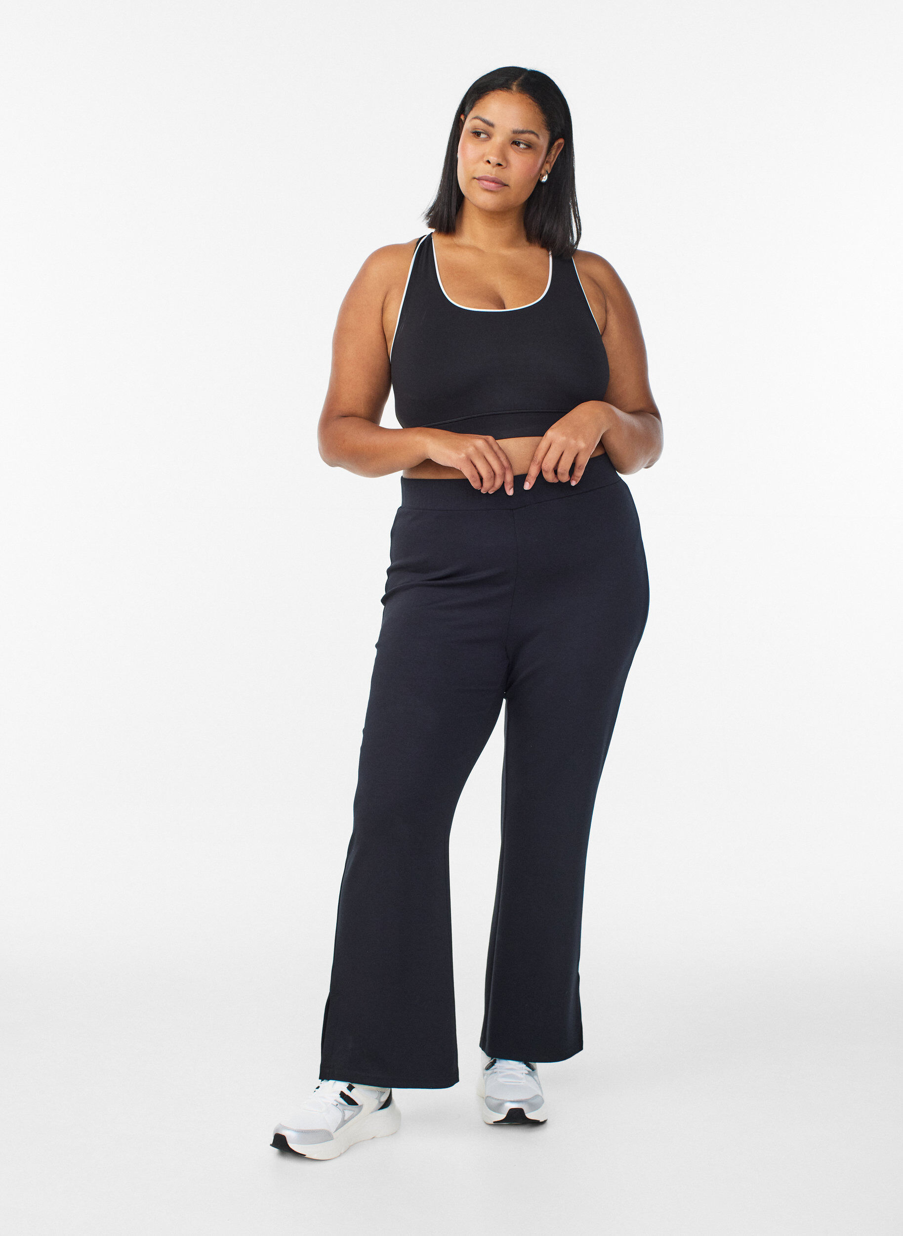 Zizzifashion Flare jersey trousers with slits and high waist, Black, Model image number 1