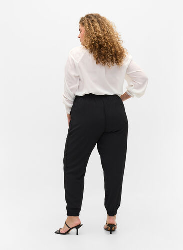 Trousers with pockets and elasticated trim, Black, Model image number 1