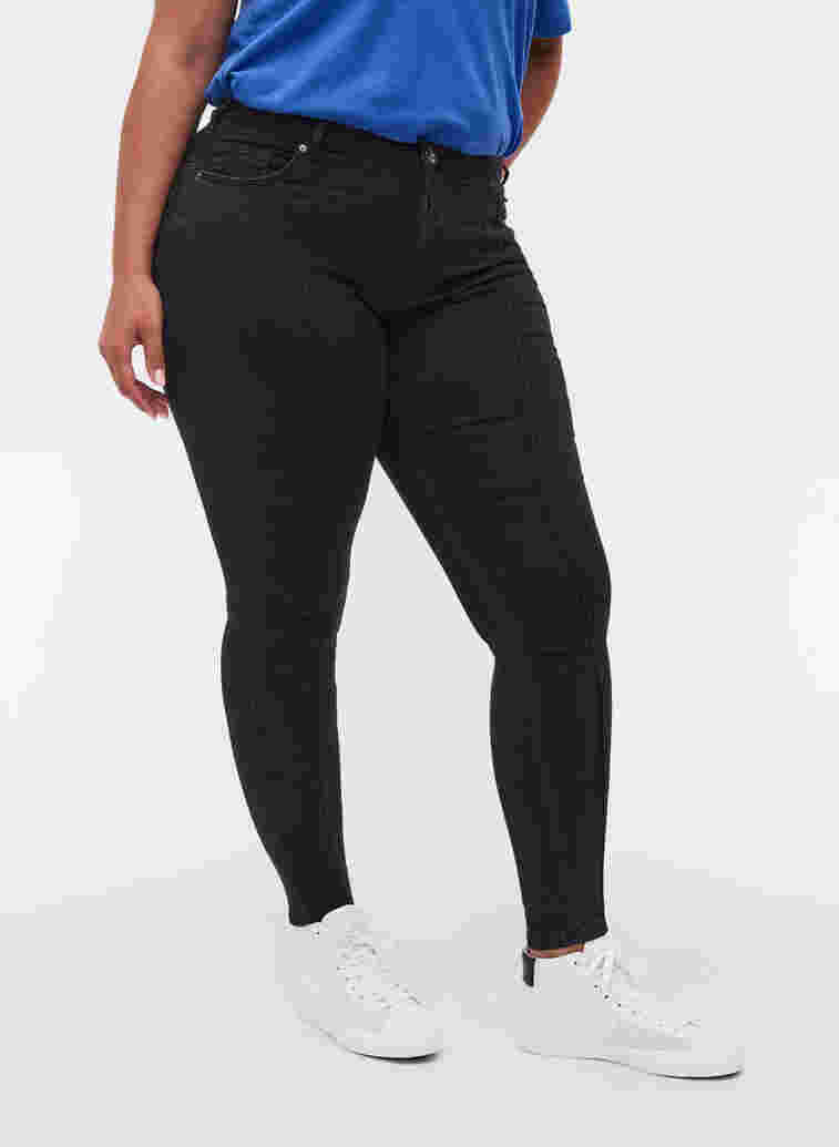 Super slim Amy jeans with piping, Black, Model image number 2