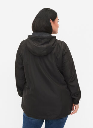 Anorak with hood and pocket, Black, Model image number 1