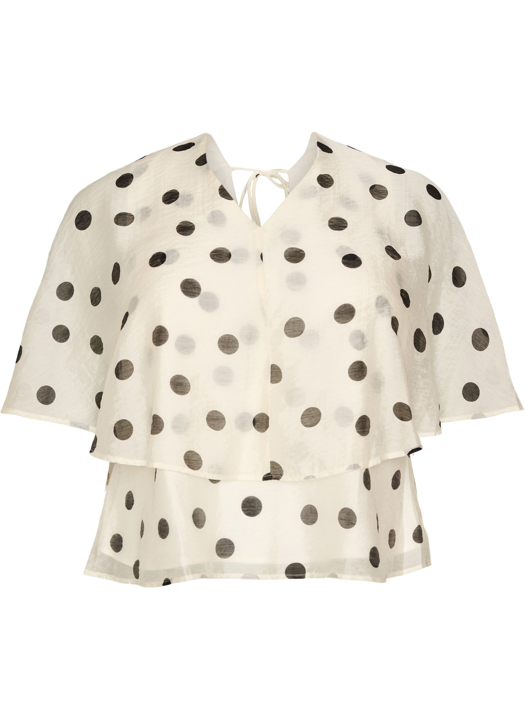 Layered top with polka dot pattern