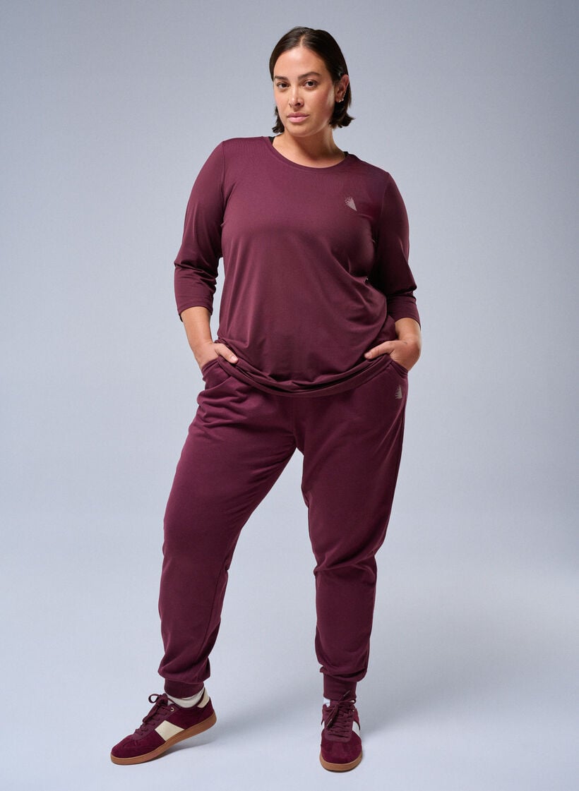 Loose tracksuit trousers with pockets, Red, Image image number 0