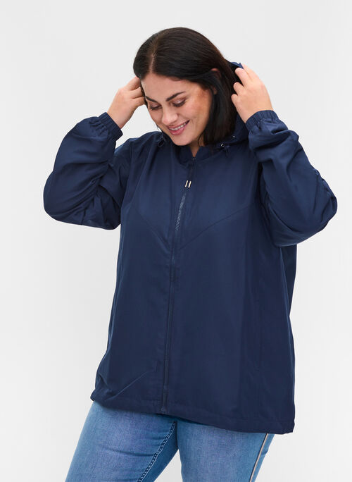 Short jacket with hood and adjustable bottom hem