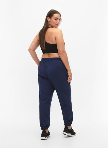 Training pants with elastic waistband and drawstring, M. Blue w. Black, Model image number 1