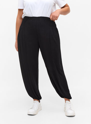 Loose-fitting trousers with smocking detail, Black, Model image number 1