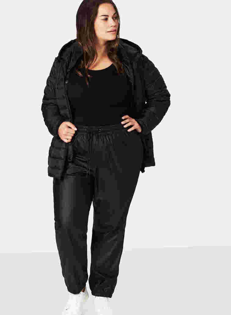 Rain trousers with taped seams, Black, Model