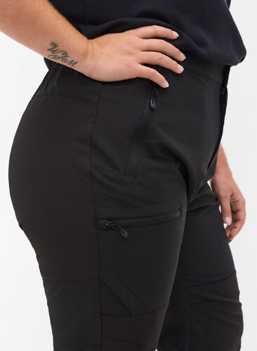 Hiking trousers with pockets, Black, Model image number 3