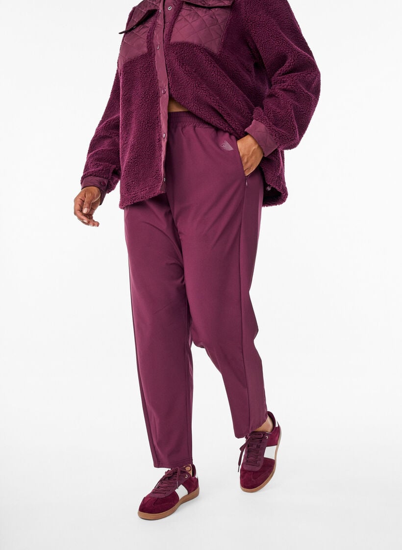 Lightweight training trousers with pockets, Red, Model image number 2