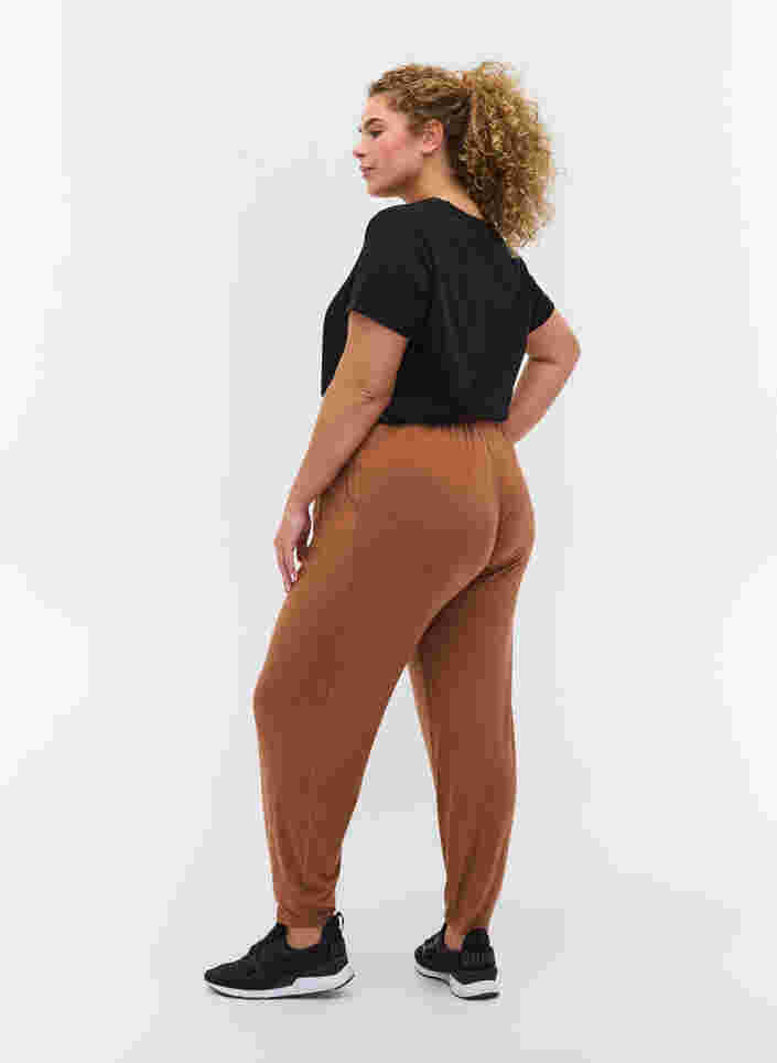 Loose viscose trousers with pockets, Rawhide, Model image number 1