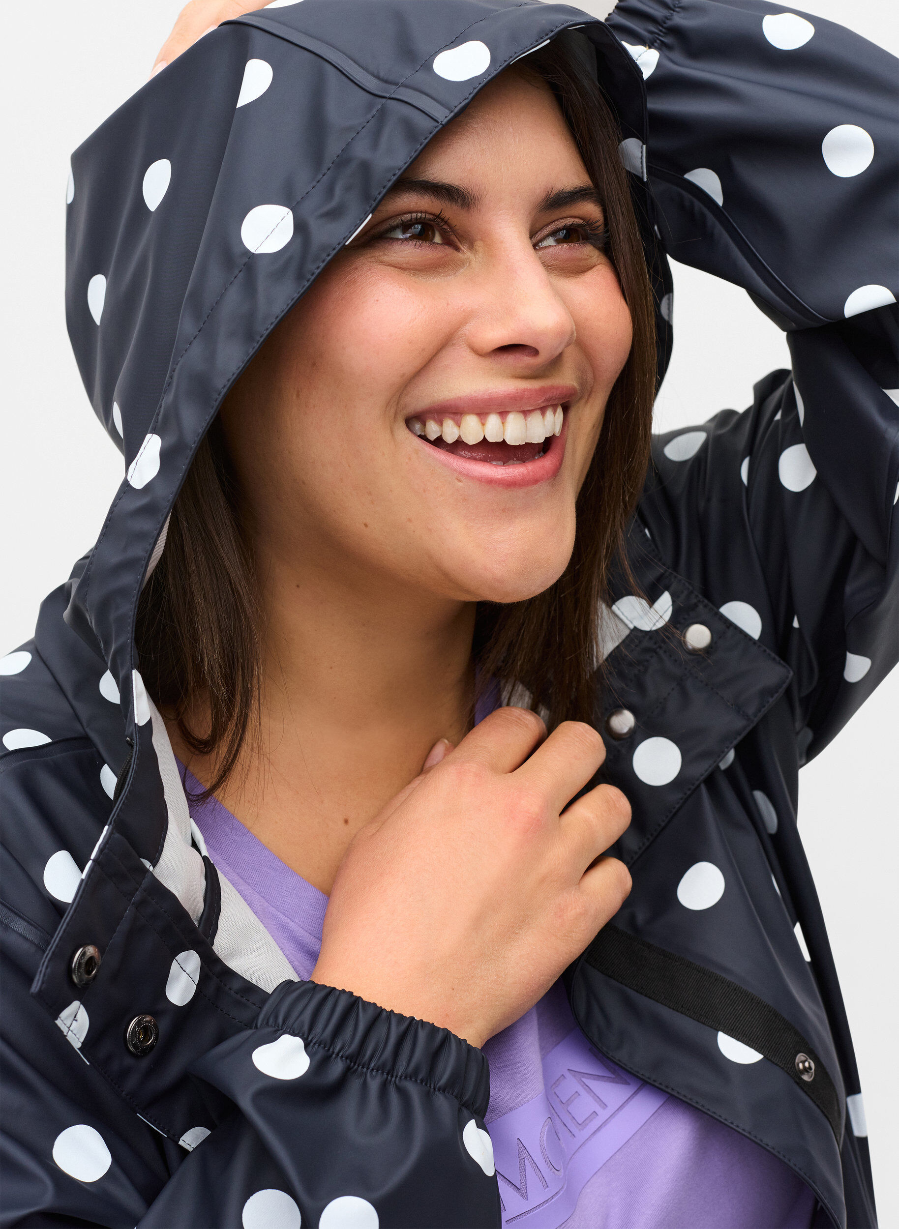 Patterned rain jacket with a hood 