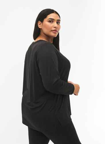 Long-sleeved training blouse with structure, Black, Model image number 1