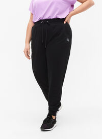 Loose workout trousers with pockets, Black, Model