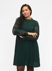Viscose dress with crochet sleeves, Scarab, Model
