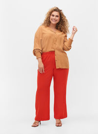 Flared trousers with pockets, Fiery Red, Model