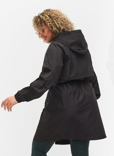 Long sports jacket with adjustable waist, Black, Model image number 1