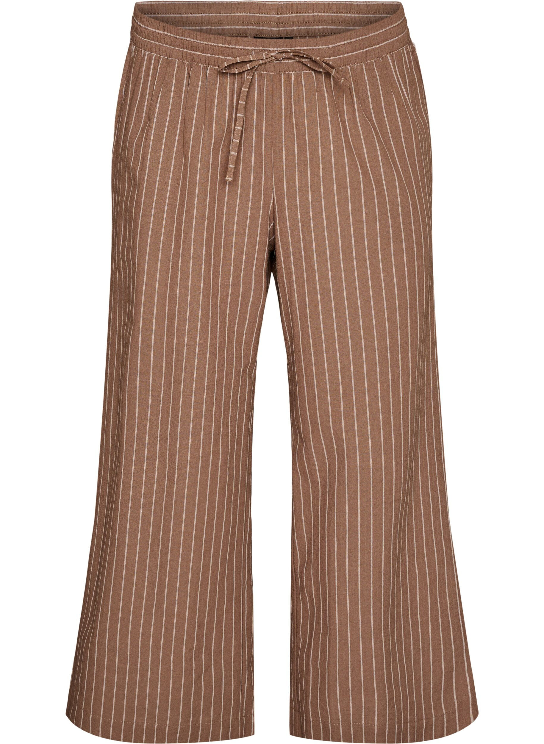 Loose trousers with high waist and pockets