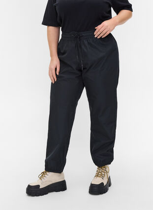 Rain trousers with elastic and drawstrings, Black, Model image number 2