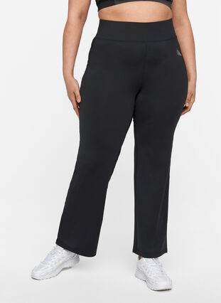 Flared exercise trousers with stretch, Black, Model image number 0