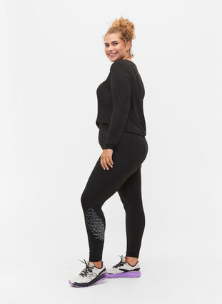 Training tights with reflective print, Black w. Reflex, Model image number 0