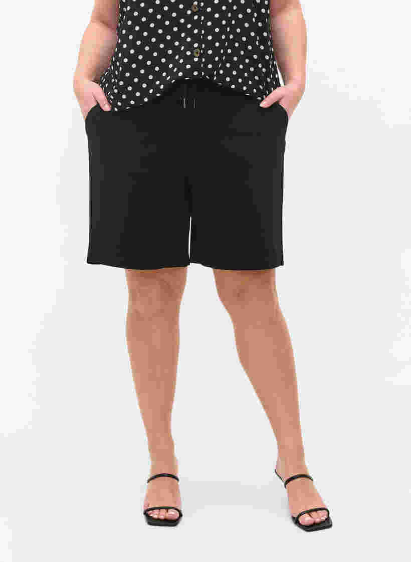 Loose shorts with drawstring and pockets, Black, Model image number 1