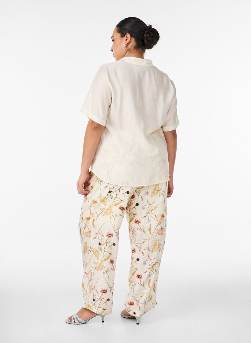 High-waisted viscose trousers with floral print, Beige, Model image number 1
