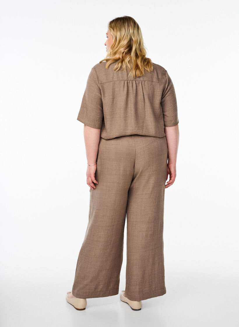 Loose trousers with elasticated waistband and pockets, Brown, Model image number 1