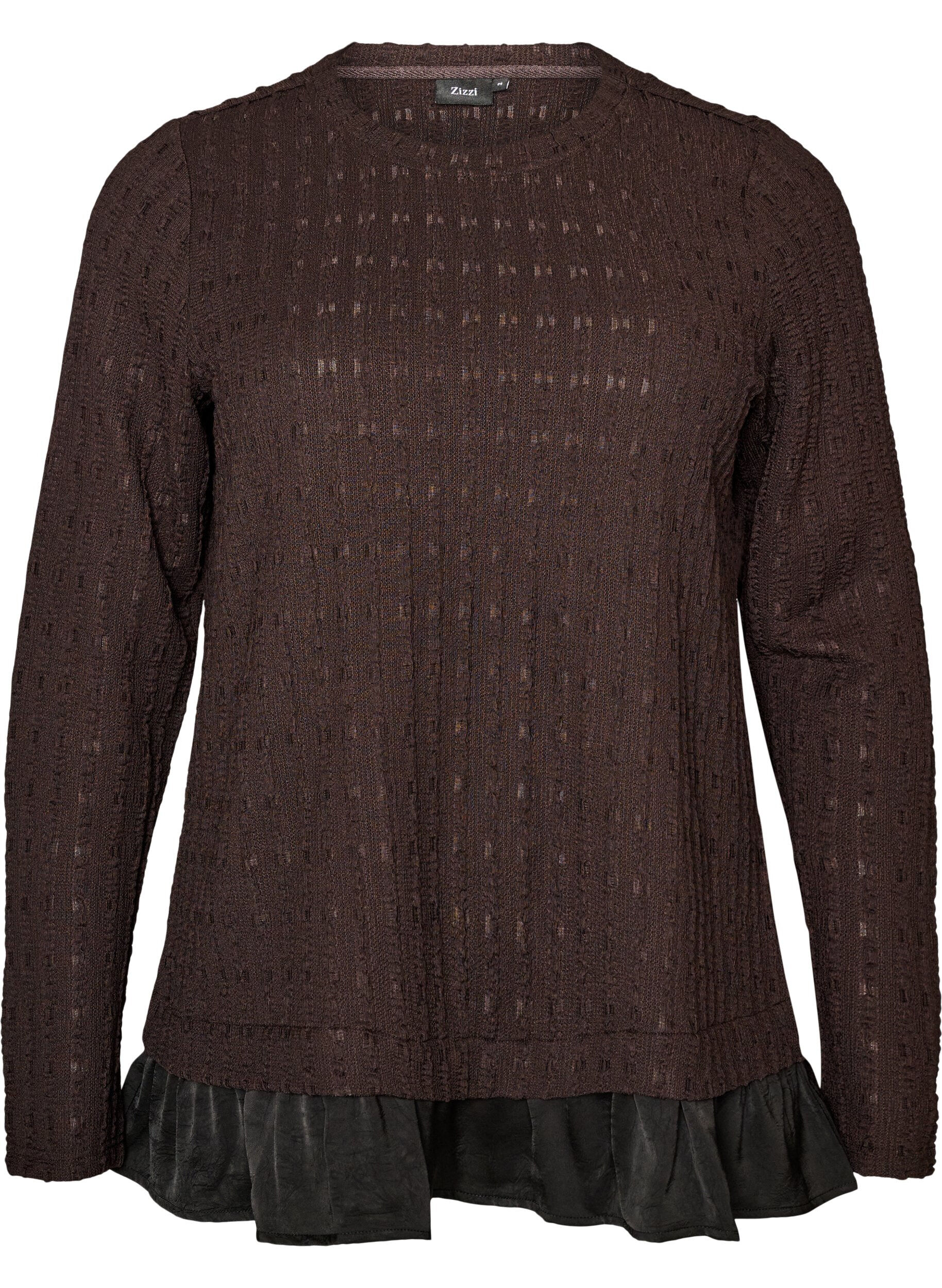 Structured blouse with ruffle hem