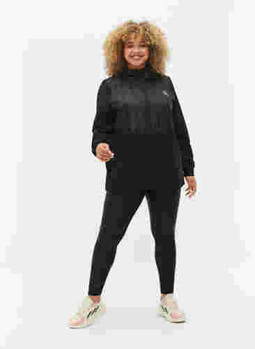 Sports jacket with pockets and hood, Black, Model image number 1