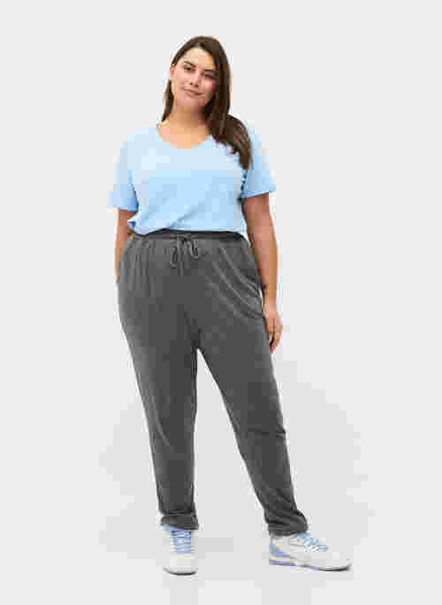 Marled trousers with drawstring and pockets