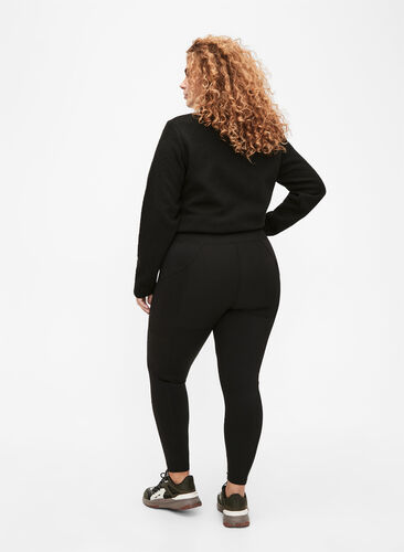 Stretchy and durable exercise leggings with pockets, Black, Model image number 1