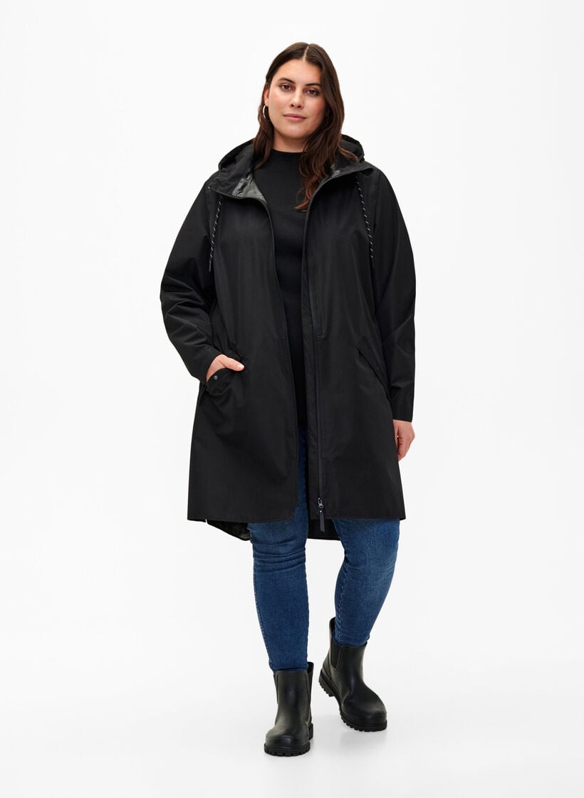Rain jacket with pockets and a hood, Black, Model image number 1