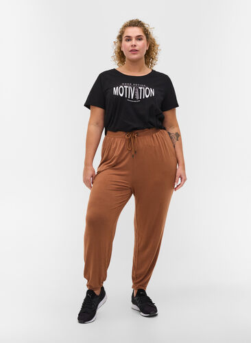 Loose viscose trousers with pockets, Rawhide, Model image number 0