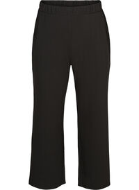 Loose trousers with pockets