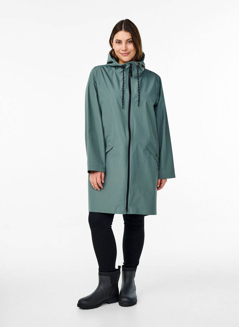 Rain jacket with pockets and hood, Green, Model image number 1