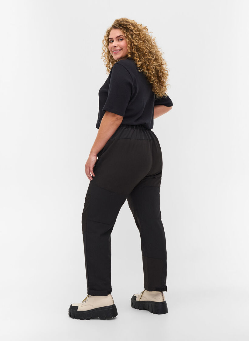 Hiking trousers with pockets, Black, Model image number 1