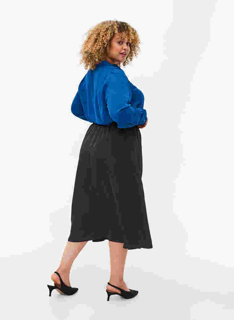 	 Loose-fitting midi skirt, Black, Model image number 1