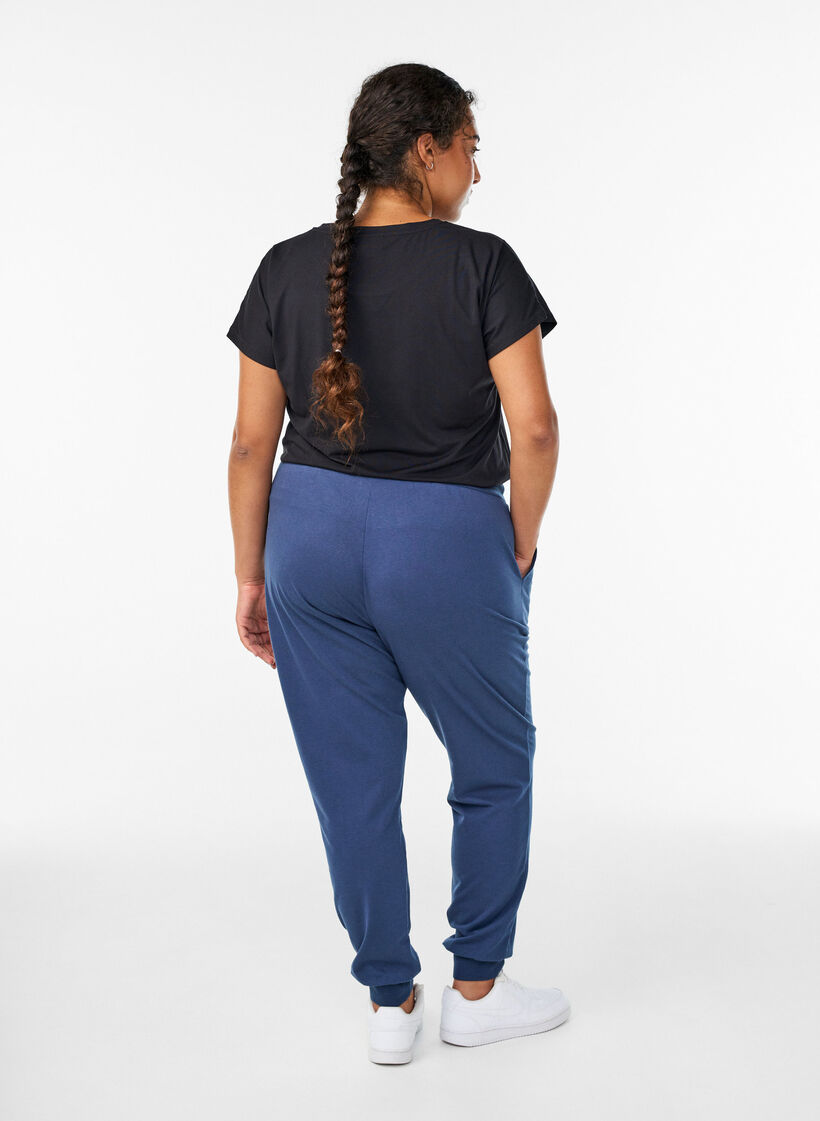 Loose tracksuit trousers with pockets, Blue, Model image number 1