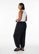 Harem trousers with cargo pockets and elasticated waist, Black, Model image number 1