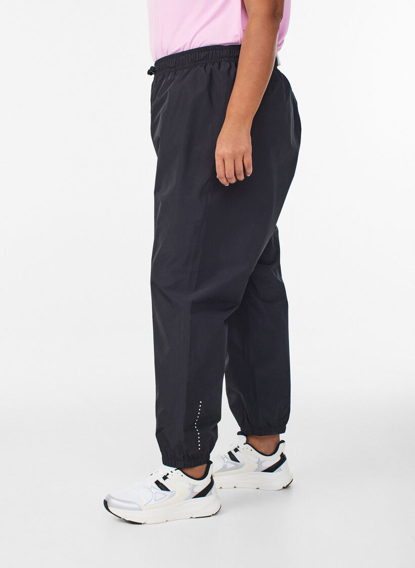 Rain trousers with reflectors, Black, Model image number 0