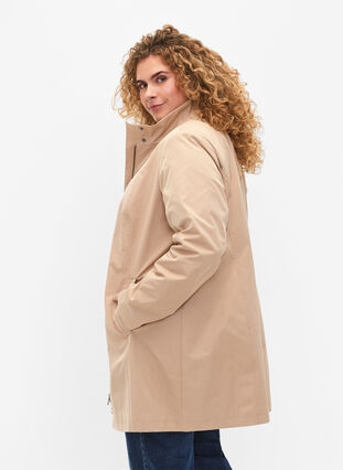 Jacket with pockets and high collar, Nomad, Model image number 1
