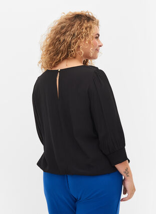 Solid-coloured viscose blouse with a balloon effect, Black, Model image number 1