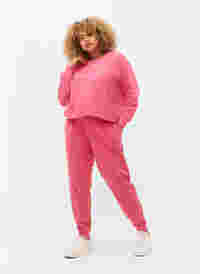 Sweatpants with print and pockets, Hot Pink AOP, Model