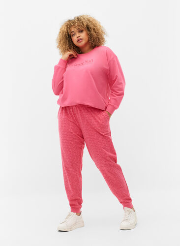Sweatpants with print and pockets, Hot Pink AOP, Model image number 0