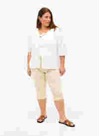 Close-fitting Emily capri trousers, Oatmeal, Model