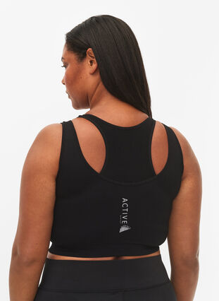 Seamless sports bra with double layer, Black, Model image number 1
