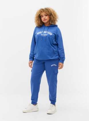 Sweatpants with cargo pockets, Dazzling Blue, Model image number 0