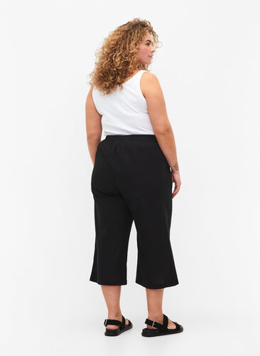 7/8 trousers in cotton blend with linen, Black, Model image number 1