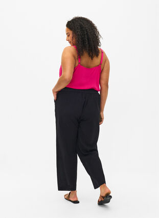 Loose pants in linen-cotton blend, Black, Model image number 1